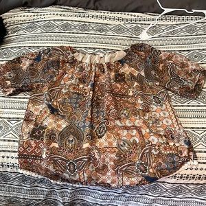 Westport brand- size 2x I loved wearing this with leggings. Comfy 100% Polyester